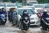 Không khí lạnh tràn xuống, miền Bắc tiếp tục mưa to